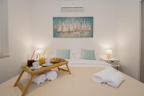 Katil atau katil-katil dalam bilik di Holiday Home Intrade