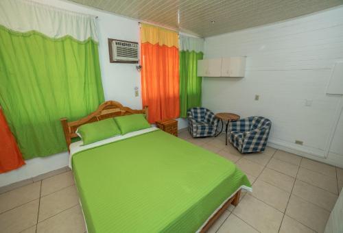 Кровать или кровати в номере Hostal Amador Familiar
