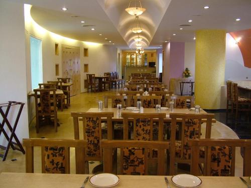 Restaurace v ubytování Hotel City Park, Solapur