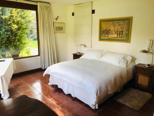 A bed or beds in a room at Casa Los Ciervos