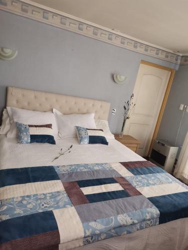 Postel nebo postele na pokoji v ubytování Hostal Boutique "Maryluz"