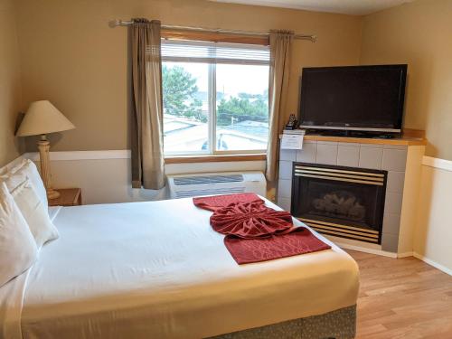 Ένα ή περισσότερα κρεβάτια σε δωμάτιο στο Hillcrest Inn