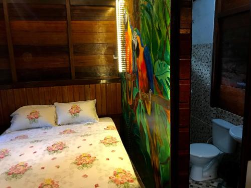 Tempat tidur dalam kamar di TerrAmor Amazon