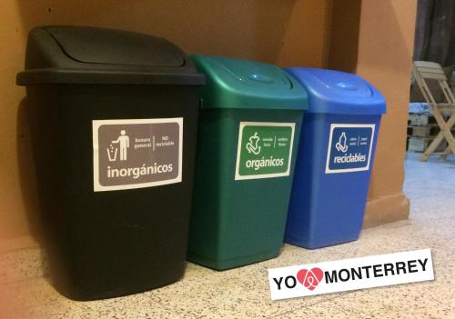 two trash cans sitting next to each other at Departamento completo a pasos de Santa Lucia mty in Monterrey