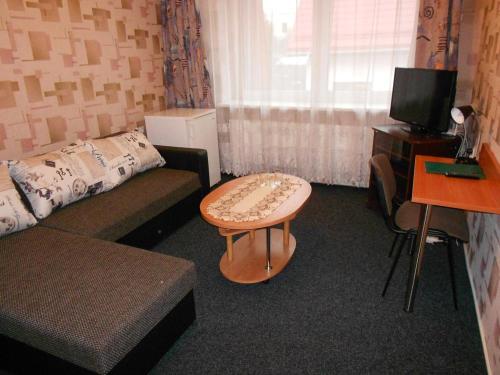 TV a/nebo společenská místnost v ubytování Jeruzale Hotel