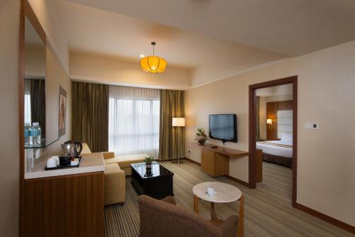 Un pat sau paturi într-o cameră la Pearl View Hotel Prai, Penang