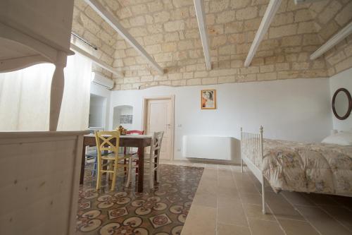 Ένα ή περισσότερα κρεβάτια σε δωμάτιο στο Ai Cappuccini Guest House