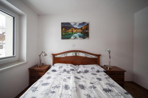 Postelja oz. postelje v sobi nastanitve Cozy Nest in the heart of Kranjska Gora