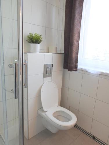 Un baño de Apartments CITY Stadion