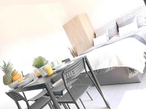 Cama o camas de una habitación en Apartments CITY Stadion