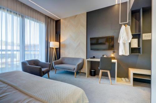 Hotel Bonifacio SPA&SPORT Resortにあるベッド
