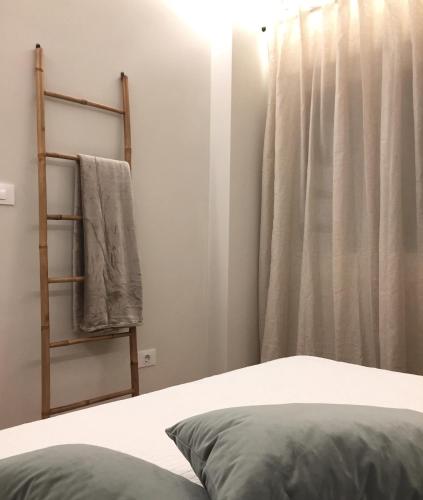 Una cama o camas en una habitación de Nordico