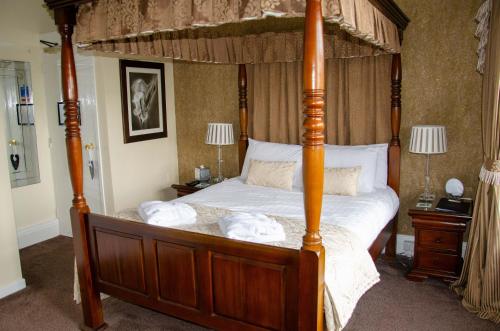 מיטה או מיטות בחדר ב-The Lemonfield Hotel