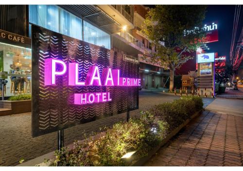 a sign that reads plaza prime hotel on a street at PLAAI Prime Hotel Rayong SHA Extra Plus in Rayong