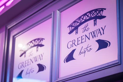 a window with a reflection of the greenway bridge at Rathkeale House Hotel in Limerick