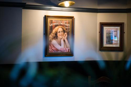 a picture of a movie on a wall at Rathkeale House Hotel in Limerick