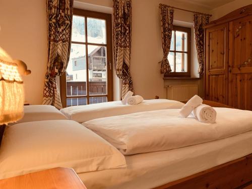Tempat tidur dalam kamar di Bachlaufen Haus