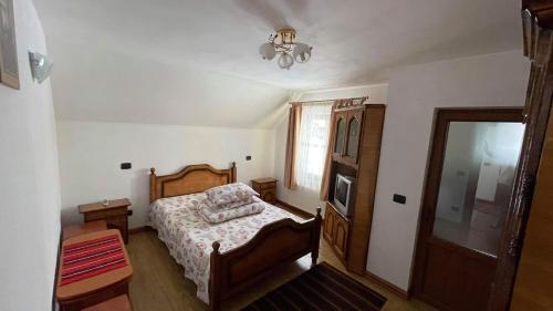 Ένα ή περισσότερα κρεβάτια σε δωμάτιο στο Casa Paty