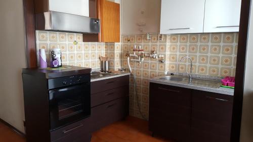 Dapur atau dapur kecil di DaNicolas Novara Apartment