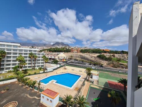 Vista sulla piscina di Апартамент в 5 мин от пляжей Лас Америкас o su una piscina nei dintorni