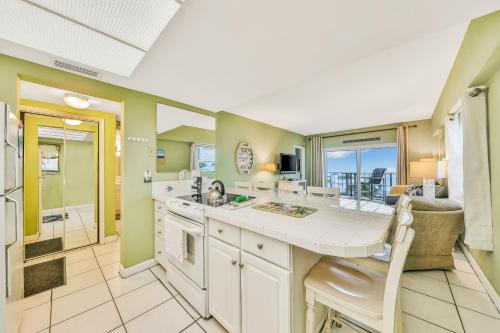 a kitchen with a sink and a counter top at Jax Beach OceanFront Getaway in Jacksonville Beach