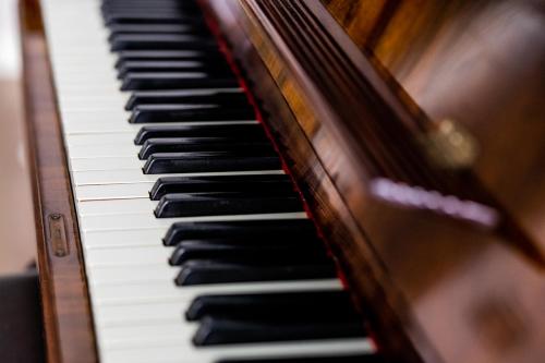 a close up of a piano keyboard at Sanfelice 33 Luxury Suites in Naples
