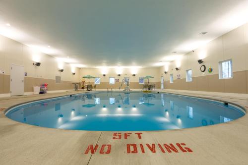 a large swimming pool with a no diving sign in the middle at Crown Resorts at Wolf Run in DuBois