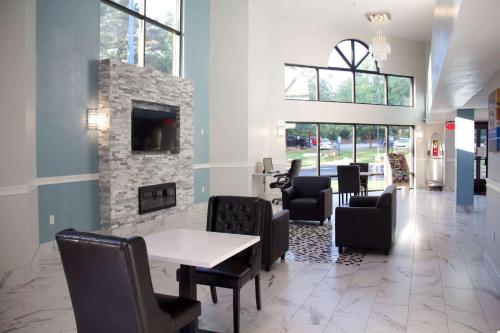 Телевизор и/или развлекательный центр в Motel 6-Suwanee, GA - Gwinnett Center