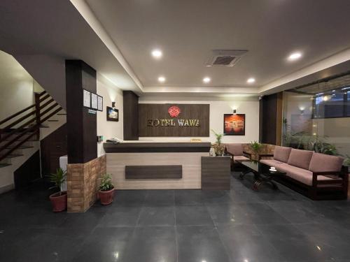 a lobby of a hotel with a waiting room at Hotel Wawa in Kathmandu