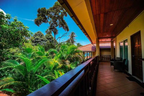 Balkón nebo terasa v ubytování Tioman Dive Resort