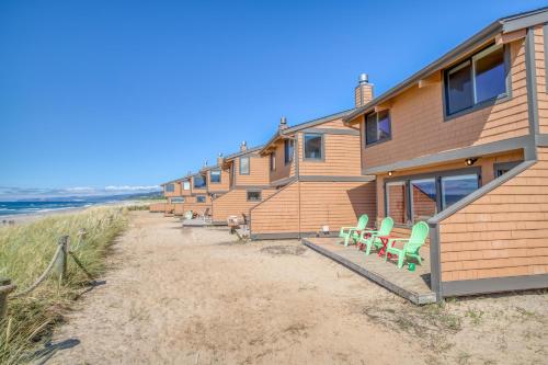 a row of beach houses on the beach at Breakers Beach House 3 - Meredith Lodging in Neskowin