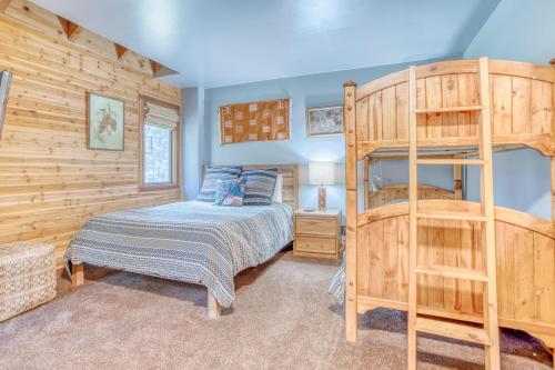 a bedroom with a bunk bed and a ladder at Wildflower 46 - Meredith Lodging in Sunriver