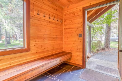 a sauna with a bench in a wooden wall at Wildflower 46 - Meredith Lodging in Sunriver