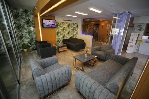 Χώρος καθιστικού στο Grand Nora Hotel