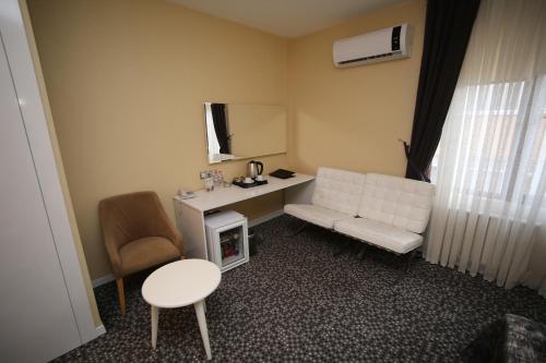 Μια τηλεόραση ή/και κέντρο ψυχαγωγίας στο Grand Nora Hotel