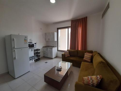 Kuchyň nebo kuchyňský kout v ubytování Furnished Apartments Near McDonald's Al-Madina Al-Monawara St