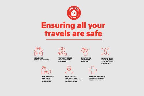 a sign that says ensuring all your travels are safe with illustrations of people at Aladdin Dream Hotel in Johor Bahru
