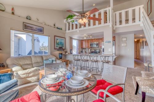 a living room with a table and chairs at Dock of the Bay 308 in Lincoln City