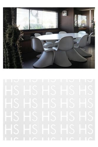 a row of tables and chairs in a room at Hotel Salus in Pescara