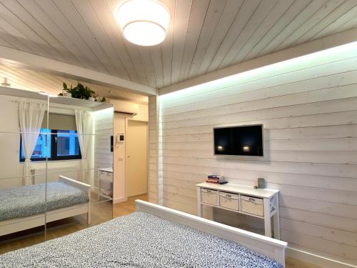 En eller flere senge i et værelse på Casa Noastra de La Mare