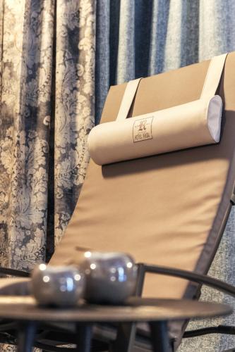 a pair of glasses sitting on top of a table at Hotel Riedl in Kössen