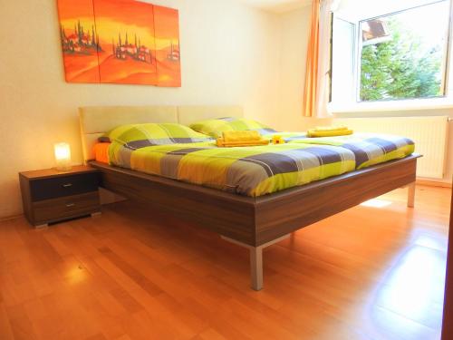 A bed or beds in a room at Linz Apartment Comfort-Size