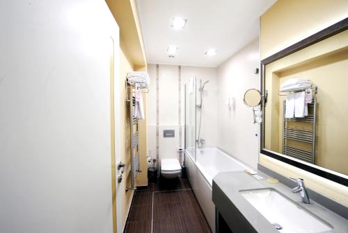 A bathroom at Grand Nora Hotel