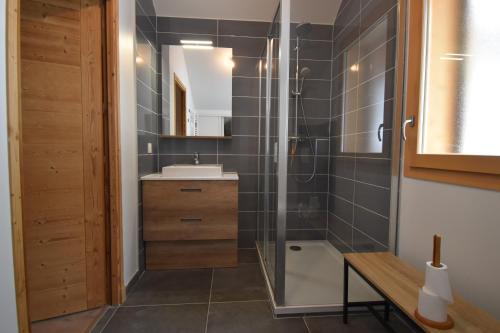 A bathroom at VAUJANYLOCATIONS - Le Chalet d Antoine et Mary