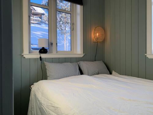 En eller flere senge i et værelse på Lemonsjøen-Jotunheimen-Besseggen