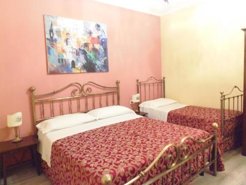 Una cama o camas en una habitación de Hotel Morlacchi
