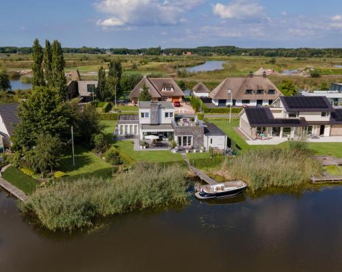 Letecký snímek ubytování Hostellerie "Het Riet" Blauwestad