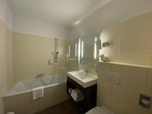 Koupelna v ubytování Hotel Am Schloss Ahrensburg