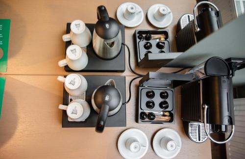 Kaffee-/Teezubehör in der Unterkunft Zum grünen Baum Hotel Frankfurt Airport