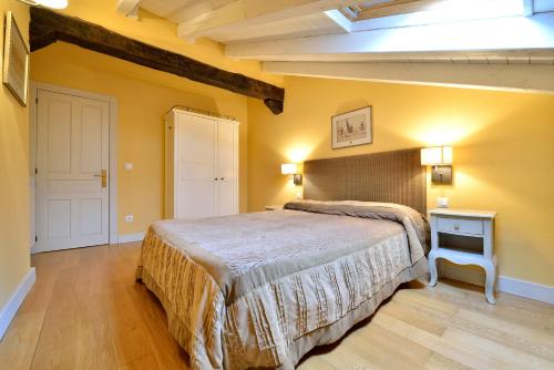 Ένα ή περισσότερα κρεβάτια σε δωμάτιο στο Casona de la Parra